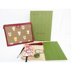 GUCCI Doraemon Collaboration GG Supreme Clutch Bag